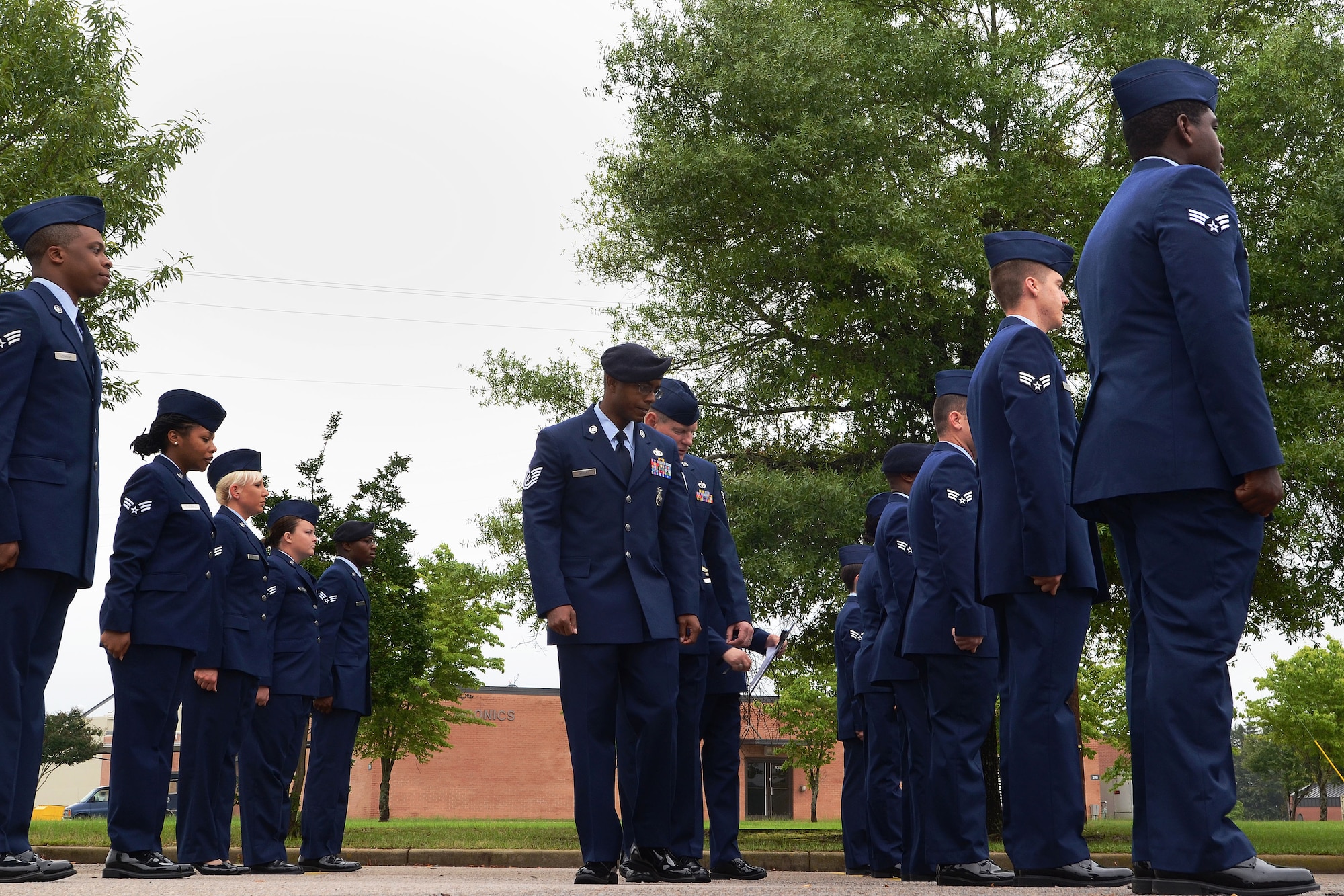 U.S. Air Force Tech. Sgt. Michael Bryant, assigned to the 169th Security Forces Squadron, performs an open-ranks inspection during an Airman Leadership School course at McEntire Joint National Guard Base, S.C. May 31, 2014.  The 169th Fighter Wing distance-learning ALS course prepares Swampfox Airmen for excellence in supervisory roles and responsibilities. (U.S. Air National Guard photo by Airman 1st Class Ashleigh S. Pavelek/Released)