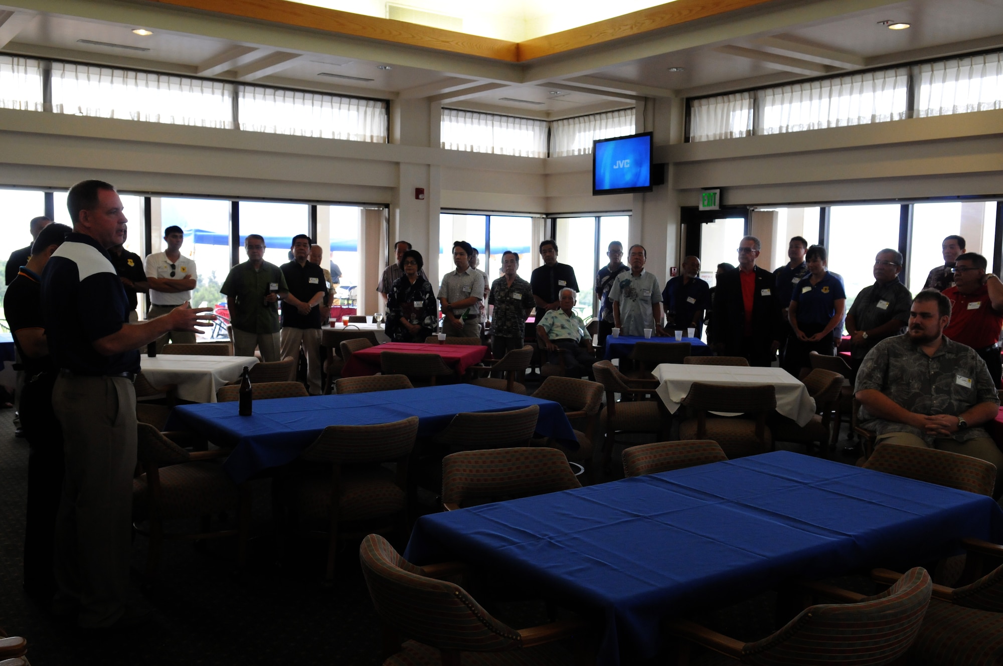 U.S. Air Force Brig. Gen. James Hecker, 18th Wing commander, welcomes and thanks Japanese officials for attending America Fest 2014 before making their way to the flight line for a fireworks show at Kadena Air Base, Japan, June 29. America Fest is a free two-day event designed to not only build positive relationships and showcase bilateral ties, but to give the local Okinawan population a taste of a Fourth of July celebration. (U.S. Air Force photo by Airman 1st Class Keith James)