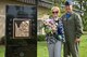 Betty Blesse, wife of retired Maj. Gen. Frederick “Boots” Blesse, stands with Lt. Col. Donn Yates after the unveiling of her late husband’s monument during a memorial dedication ceremony, June 27, 2014, on Seymour Johnson Air Force Base, N.C. The memorial was constructed at the front of the 334th FS, the unit Blesse was assigned to when he recorded his 10th aerial kill. Yates is the 334th Fighter Squadron commander. (U.S. Air Force photo/Airman 1st Class Aaron J. Jenne)
