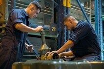 Lance Cpls. Isaih Alamillo, left, and Jonathan A. Ramos double-check a water valve during a mobility exercise June 18 on Camp Hansen. This was part of an exercise to test the Marines on their response time in case they are needed for a deployment. Alamillo is a Los Angeles, California, native, and Ramos is a Staten Island, New York, native. Both are bulk fuel specialists with Bulk Fuel Company, 9th Engineer Support Battalion, 3rd Marine Logistics Group, III Marine Expeditionary Force. (U.S. Marine Corps photo by Lance Cpl. Robert Williams Jr./Released)


