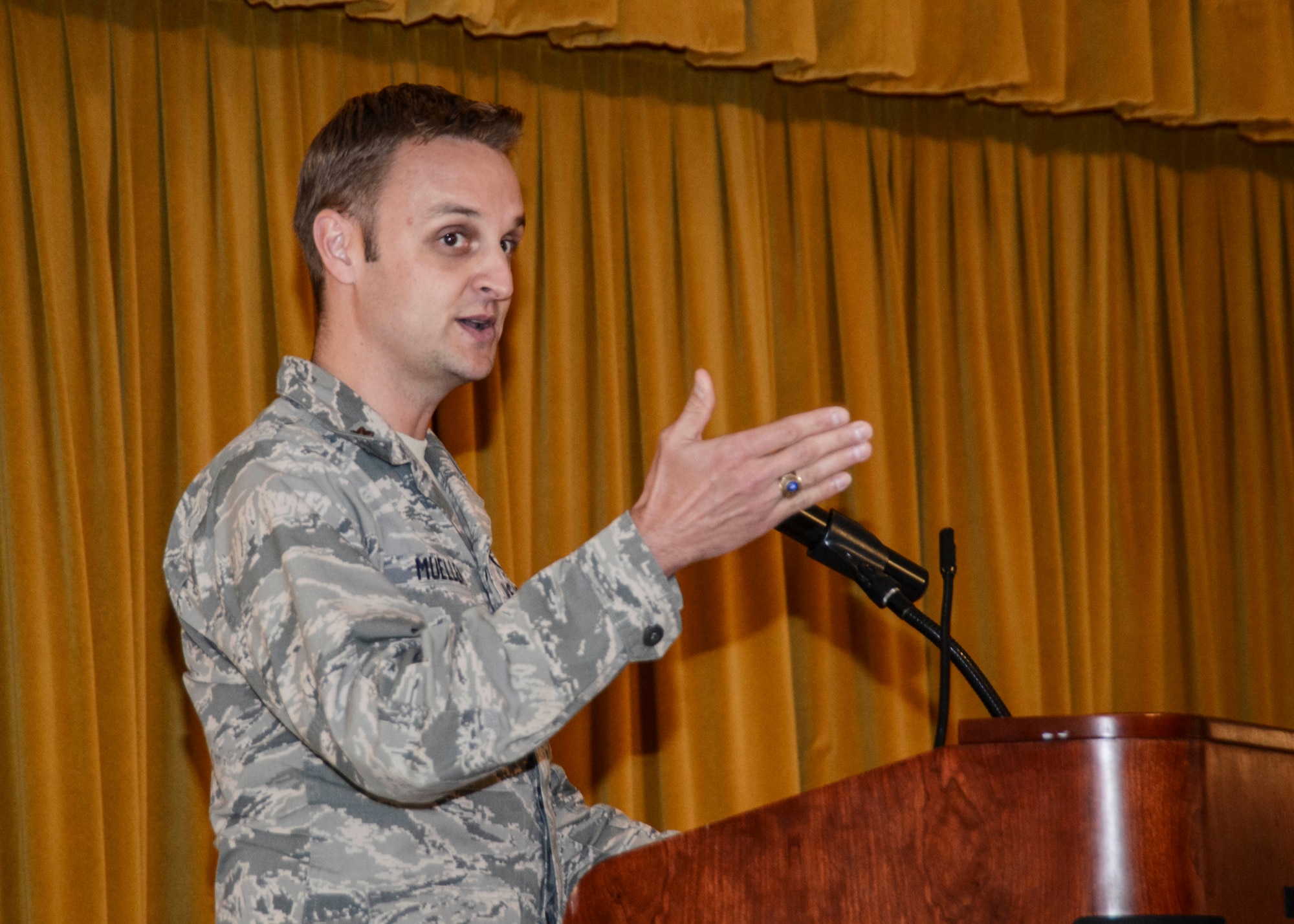 Keynote speaker, Maj. Jeffrey Mueller, GPS Enterprise Integration Section chief at Los Angeles AFB, shared his story as an LGBT servicemember, before and after the repeal of “Don’t Ask, Don’t Tell.” (U.S. Air Force photo by Rebecca Amber) 