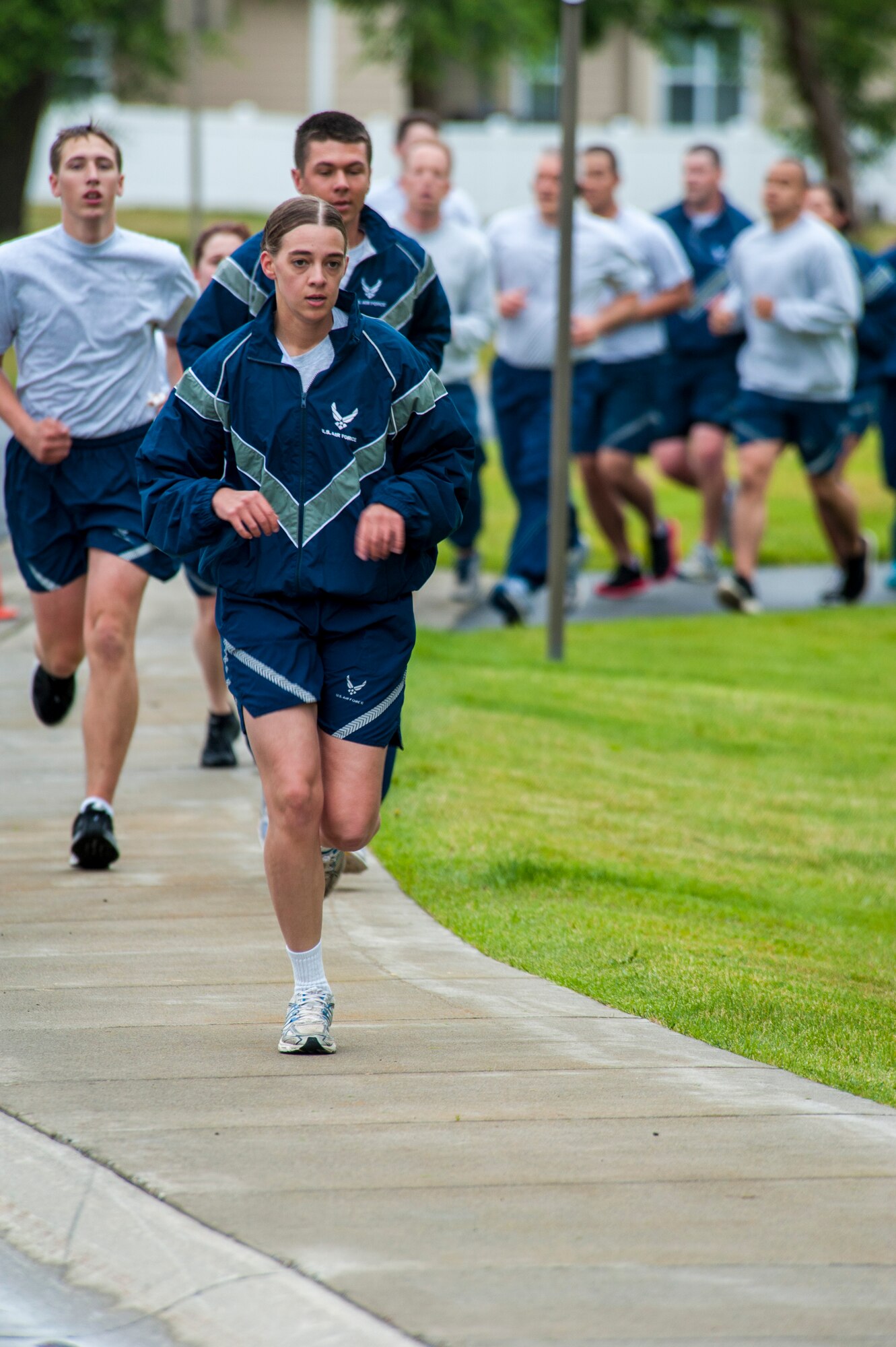 Fairchild Airmen participate in a monthly wing run at Fairchild Air Force Base, Washington, June 27, 2014. Wing runs allow Airmen to personally assess their physical fitness and enhance unit cohesion through team morale and welfare. (U.S. Air Force photo by Staff Sgt. Benjamin W. Stratton/Released)