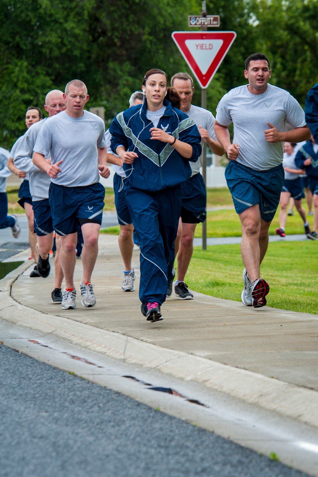 Fairchild Airmen participate in a monthly wing run at Fairchild Air Force Base, Washington, June 27, 2014. Wing runs allow Airmen to personally assess their physical fitness and enhance unit cohesion through team morale and welfare. (U.S. Air Force photo by Staff Sgt. Benjamin W. Stratton/Released)