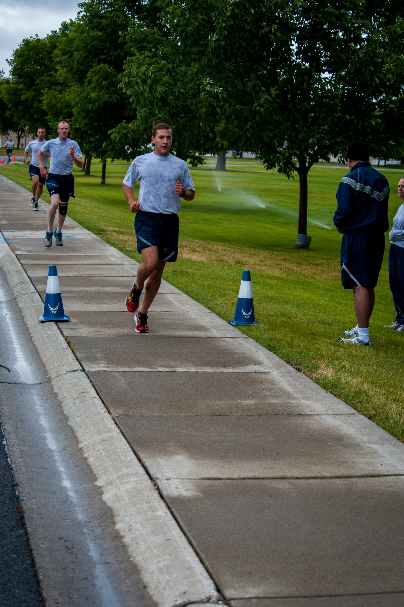Fairchild Airmen participate in a monthly wing run at Fairchild Air Force Base, Washington, June 27, 2014. Wing runs allow Airmen to personally assess their physical fitness and enhance unit cohesion through team morale and welfare. (U.S. Air Force photo by Staff Sgt. Benjamin W. Stratton/Released)