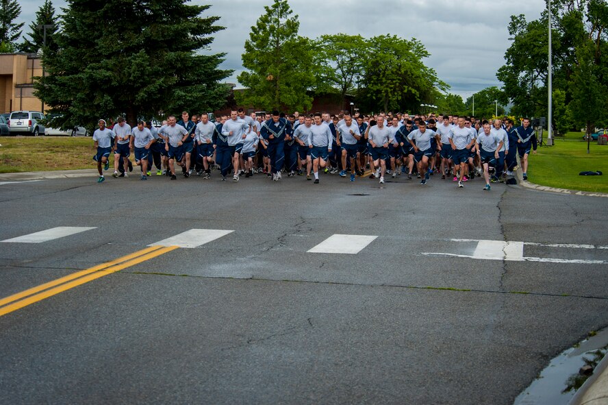 Fairchild Airmen participate in a monthly wing run at Fairchild Air Force Base, Washington, June 27, 2014. Wing runs allow Airmen to personally assess their physical fitness and enhance unit cohesion through team morale and welfare. (U.S. Air Force photo by Staff Sgt. Benjamin W. Stratton/Released)