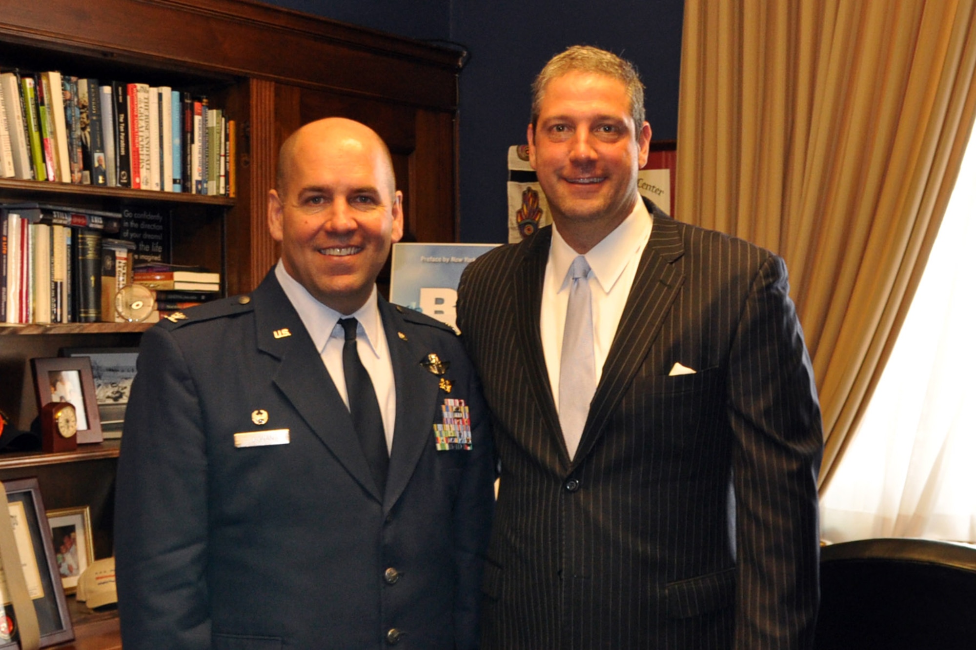 WASHINGTON, D.C. -- Air Force Reserve Col. James Dignan, commander of the 910th Airlift Wing, based at Youngstown Air Reserve Station (YARS), Ohio stands for a photo with Congressman Tim Ryan, Ohio 13th district, on Capitol Hill here, June 26, 2014. Dignan visited the congressman’s office to discuss the 910th’s mission as well as several issues concerning the unit and installation as part of the commander’s Air Force Reserve Capitol Hill Visit program, June 25 and 26, 2014. The primary purpose of the program is to assist commanders in improving and building on relationships established with Congressional delegations and to increase their unit’s visibility with members of Congress. U.S. Air Force photo by Master Sgt. Bob Barko Jr.