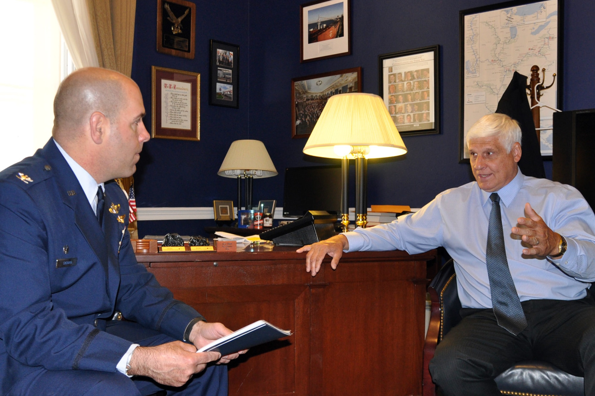 WASHINGTON, D.C.  -- Air Force Reserve Col. James Dignan, commander of the 910th Airlift Wing, based at Youngstown Air Reserve Station (YARS), Ohio listens to Congressman Bob Gibbs, Ohio 7th district, on Capitol Hill here, June 26, 2014. Dignan visited the congressman’s office to discuss the 910th’s mission as well as several issues concerning the unit and installation as part of the commander’s Air Force Reserve Capitol Hill Visit program, June 25 and 26, 2014. The primary purpose of the program is to assist commanders in improving and building on relationships established with Congressional delegations and to increase their unit’s visibility with members of Congress. U.S. Air Force photo by Master Sgt. Bob Barko Jr.