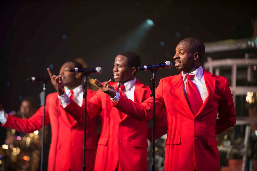 Tops in Blue members perform at the Minot Municipal Auditorium in Minot, N.D., June 27, 2014. Tops in Blue’s mission is to serves as an expeditionary entertainment unit to provide quality entertainment from within Air Force resources for the Air Force family, with priority to Air Force personnel stationed worldwide at remote and deployed locations while simultaneously promoting community relations, supporting recruiting efforts and serving as ambassadors for the United States of America and the United States Air Force. (U.S. Air Force photo/Airman 1st Class Lauren Pitts)