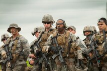 Airmen from the 91st Security Support Squadron’s tactical response force are briefed after a recapture, recovery exercise at a launch facility in North Dakota, June 26, 2014. The exercise simulated an opposing force taking over a launch facility and the defenders then recovering the asset. (U.S. Air Force photo/Airman 1st Class Apryl Hall)
