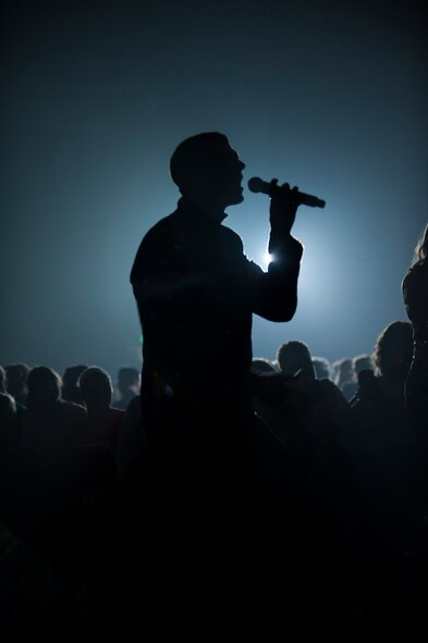 Tops in Blue members perform at the Minot Municipal Auditorium in Minot, N.D., June 27, 2014. Tops in Blue’s mission is to serves as an expeditionary entertainment unit to provide quality entertainment from within Air Force resources for the Air Force family, with priority to Air Force personnel stationed worldwide at remote and deployed locations while simultaneously promoting community relations, supporting recruiting efforts and serving as ambassadors for the United States of America and the United States Air Force. (U.S. Air Force photo/Airman 1st Class Apryl Hall)