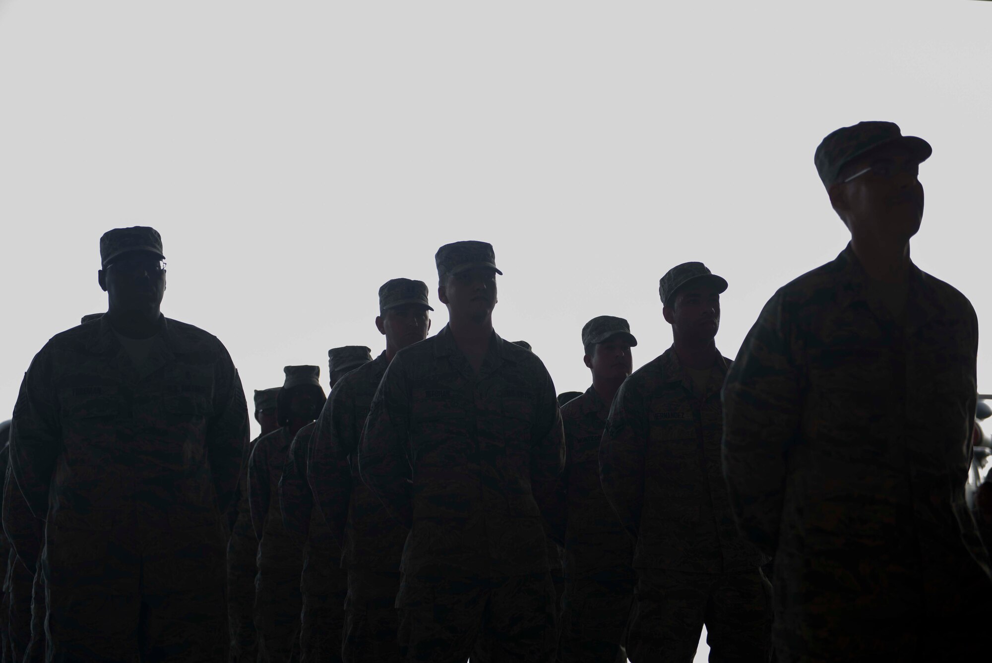Airmen from the 23d Medical Group stand during a change of command cereomony June 30, 2014, at Moody Air Force Base, Ga. During the ceremony, Airmen witnessed U.S. Air Force Col. Peter Breed assume command of the unit from Col. Paul Gardetto. (U.S. Air Force Photo by Airman Dillian Bamman/Released)