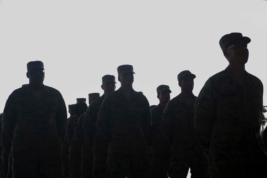 Airmen from the 23d Medical Group stand during a change of command cereomony June 30, 2014, at Moody Air Force Base, Ga. During the ceremony, Airmen witnessed U.S. Air Force Col. Peter Breed assume command of the unit from Col. Paul Gardetto. (U.S. Air Force Photo by Airman Dillian Bamman/Released)