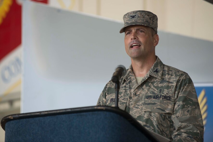 U.S. Air Force Col. Peter Breed gives closing remarks after assuming command of the 23d Medical Group June 30, 2014, at Moody Air Force Base, Ga. Breed joins the Flying Tigers team after serving as command bioenvironmental engineer at Headquarters Air Combat Command, Joint Base Langley-Eustic, Va. (U.S. Air Force photo by Airman Dillian Bamman/Released)