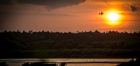 An Air Force Reserve aircrew flying a C-130 Hercules assigned to the 910th Airlift Wing, Youngstown Air Reserve Station, Ohio, performs aerial spraying June 25, 2014, over Joint Base Charleston, South Carolina. The C-130 Hercules and crew sprayed for mosquitos on JB Charleston and is the only unit of its kind in the Air Force. (U.S. Air Force photo/Airman 1st Class Clayton Cupit) 

