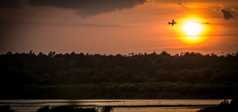 An Air Force Reserve aircrew flying a C-130 Hercules assigned to the 910th Airlift Wing, Youngstown Air Reserve Station, Ohio, performs aerial spraying June 25, 2014, over Joint Base Charleston, S.C. The C-130 Hercules and crew sprayed for mosquitos on JB Charleston and is the only unit of its kind in the Air Force.  (U.S. Air Force photo/Airman 1st Class Clayton Cupit)