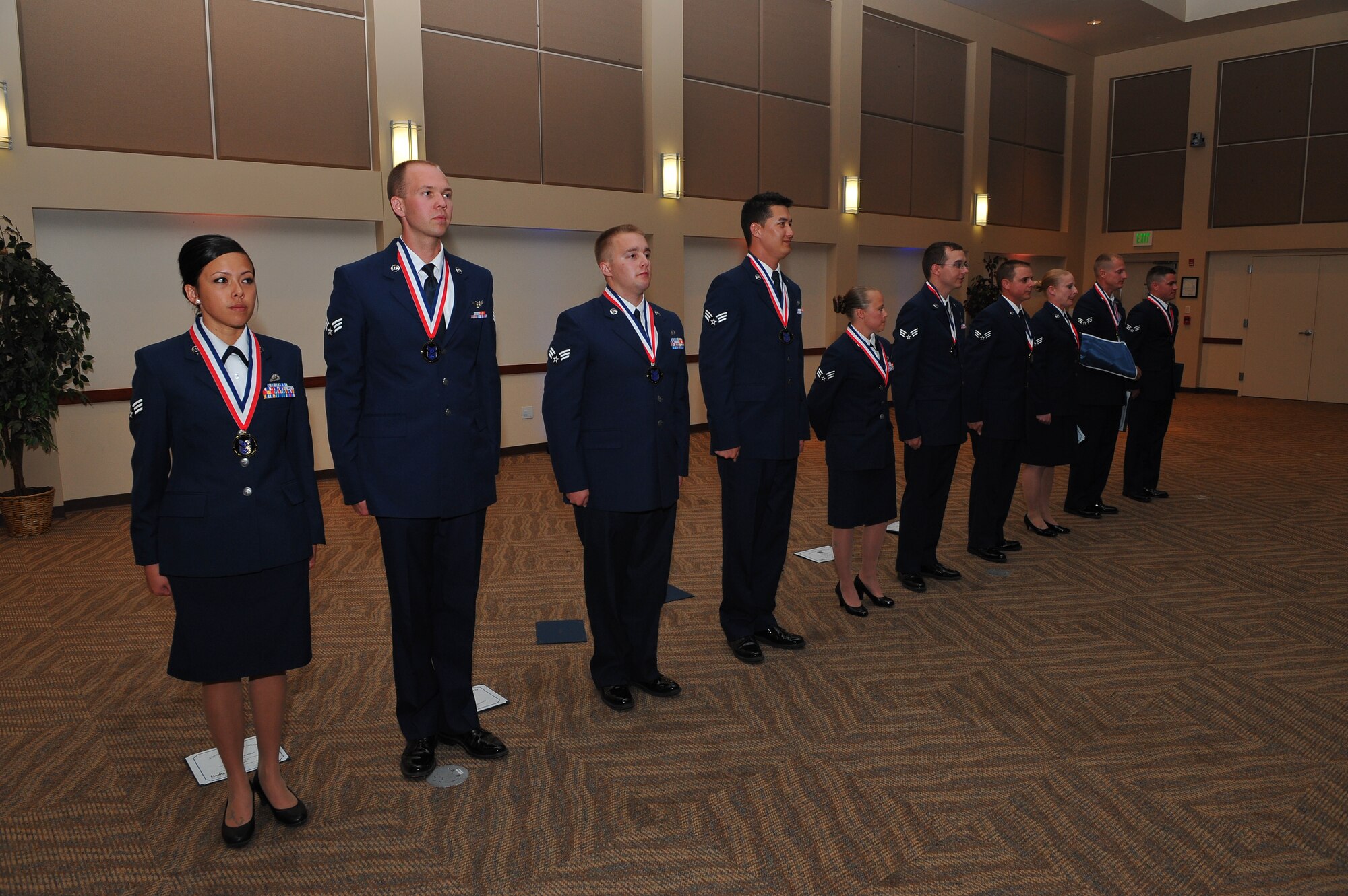 Buckley Airman Leadership School Class 14-D stand together after their graduation June 26, 2014, at the Leadership Development Center on Buckley Air Force Base, Colo. This graduation represents an important part of the enlisted force professional military education, teaching valuable skills required for supervisors.  (U.S. Air Force photo by Senior Airman Phillip Houk/Released)