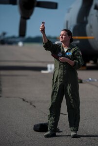 Maj. Jen Remmers, 910th Airlift Wing, Youngstown Air Reserve Station, Ohio, checks the wind speed June 25, 2014, at Joint Base Charleston, S.C. The C-130 Hercules and crew sprayed for mosquitos on JB Charleston and is the only unit of its kind in the Air Force.  (U.S. Air Force photo/Airman 1st Class Clayton Cupit)