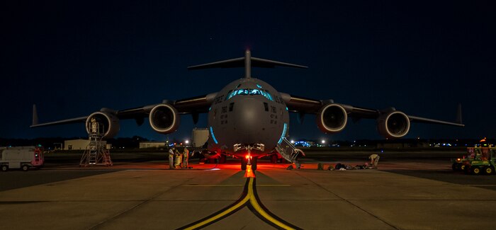 437th Airlift Wing maintainers perform routine maintenance and system checks on a C-17 Globemaster III June 25, 2014, at Joint Base Charleston, S.C. The maintainers perform checks and maintenance around the clock to ensure the aircraft are ready to fly. (U.S. Air Force photo/ Airman 1st Class Clayton Cupit)