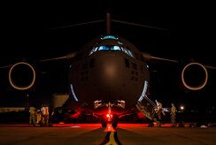 437th Airlift Wing maintainers perform routine maintenance and system checks on a C-17 Globemaster III June 25, 2014, at Joint Base Charleston, South Carolina. The maintainers perform checks and maintenance around the clock to ensure the aircraft are ready to fly. (U.S. Air Force photo/Senior Airman Dennis Sloan) 

