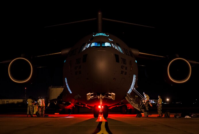 437th Airlift Wing maintainers perform routine maintenance and system checks on a C-17 Globemaster III June 25, 2014, at Joint Base Charleston, S.C. The maintainers perform checks and maintenance around the clock to ensure the aircraft are ready to fly. (U.S. Air Force photo/ Senior Airman Dennis Sloan) 