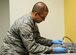 Airman 1st Class Anthony Calderon samples tap water at Joint Base Andrews, Md., June 27, 2014, to demonstrate how the 779th Bioenvironmental Flight analyses the supply to ensure it meets quality standards. The bio flight releases a yearly water quality report to comply with the Safe Drinking Water Act. (U.S. Air Force photo/ Senior Airman Mariah Haddenham)