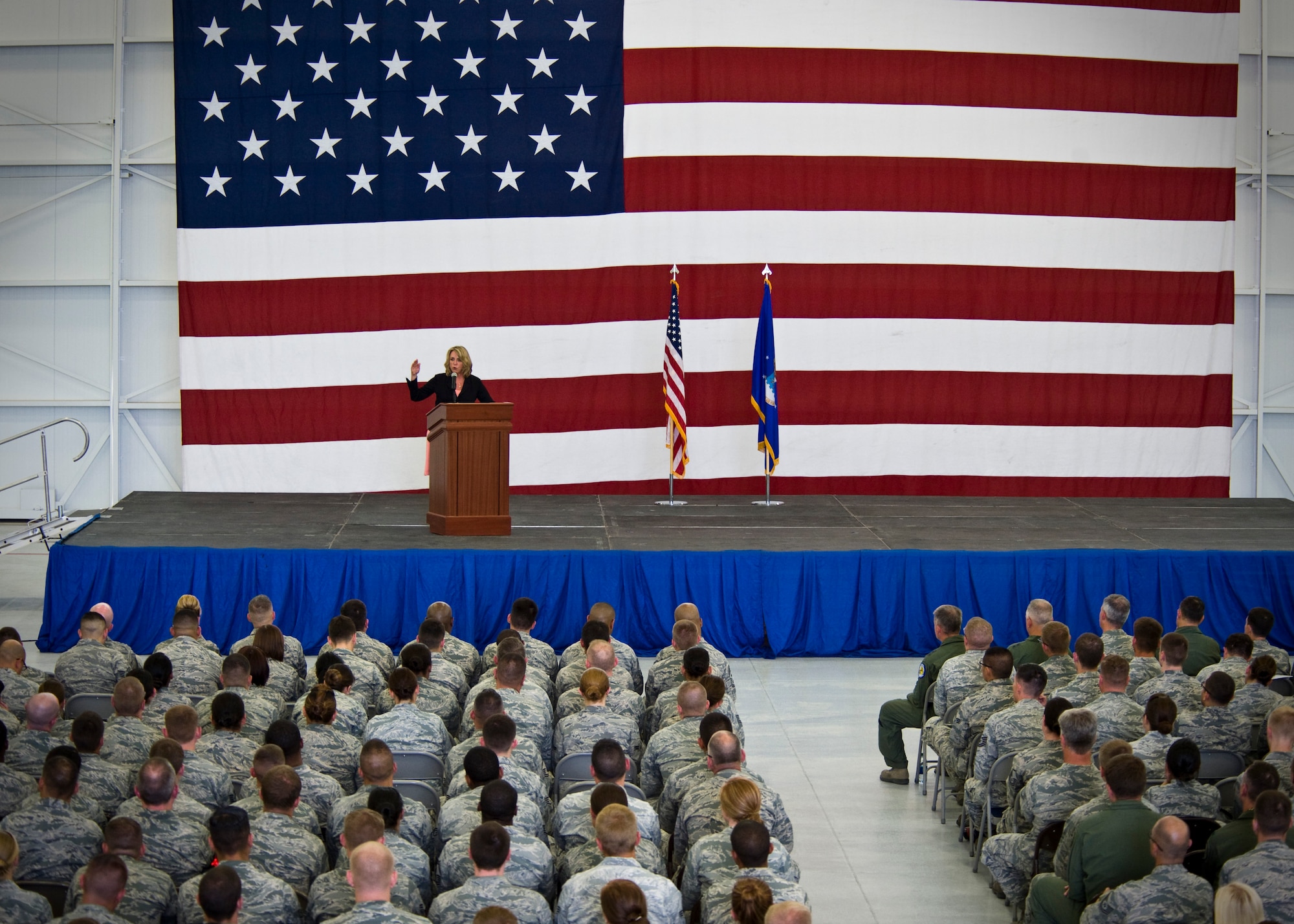 Secretary of the Air Force Deborah Lee James, speaks to Airmen during an all call June 20, 2014, at Nellis Air Force Base, Nev. James is responsible for the affairs of the Department of the Air Force, including organizing, training, equipping and providing for the welfare of its more than 690,000 active duty, guard, reserve and civilian Airmen and their families. (U.S. Air Force photo by Senior Airman Jason Couillard)
