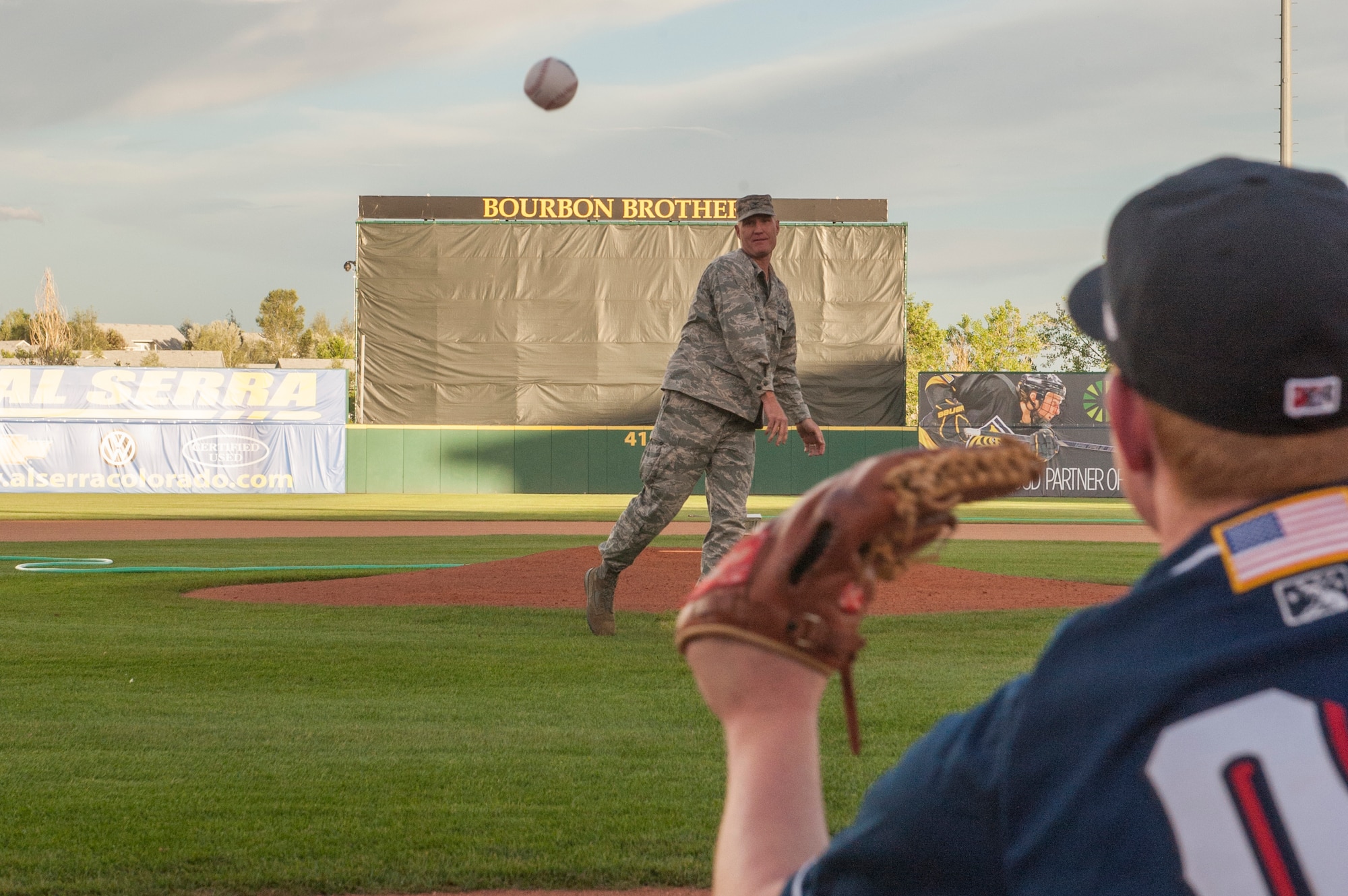 COLORADO SPRINGS, Colo. - Col. Michael Hough, 21st Space Wing vice commander, throws out the first pitch during the second game of a double header at the Colorado Springs Sky Sox Military Appreciation event June 26. The Sky Sox lost the first game to the Iowa Cubs, but won the second game 7-6. (U.S. Air Force photo/Philip Carter)