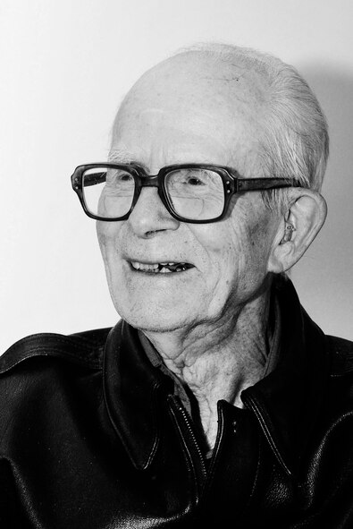 William Siler, 98, a World War II veteran, reflects on his service June 4, 2014, on RAF Mildenhall, England. In 1941, Siler joined the Royal Canadian Air Force as a navigator until 1943, when he joined the U.S. Army Air Force. (U.S. Air Force photo/Karen Abeyasekere/Released)