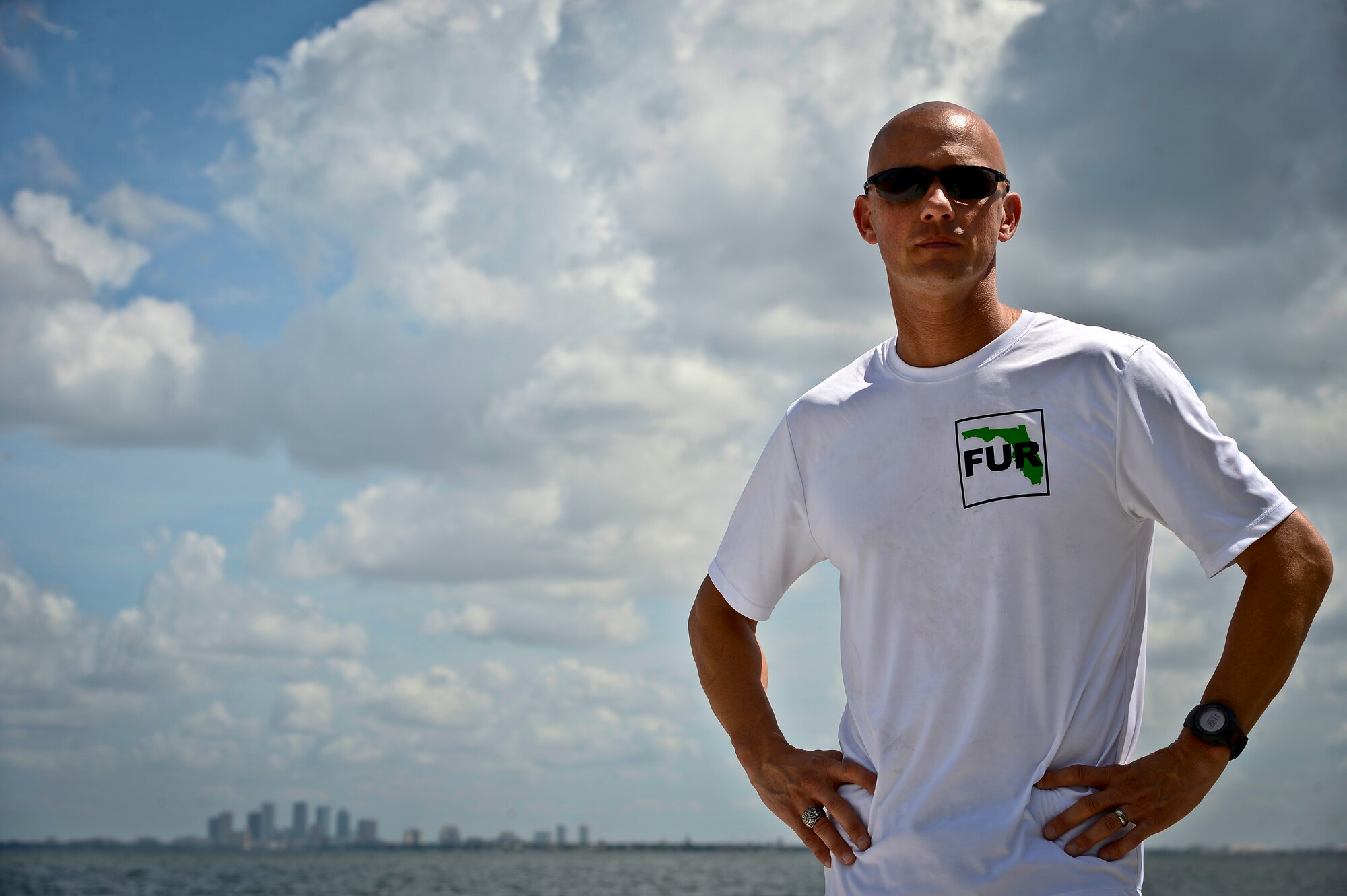 Master Sgt. Matthew Mancuso, U.S. Central Command commander’s administrative staff manager, poses for a photo on Bayshore Blvd. at MacDill Air Force Base, Fla., June 27, 2014. Mancuso has run 18 marathons and is currently training for the Florida Keys 100 scheduled for May 2015. (U.S. Air Force photo by Senior Airman Vernon L. Fowler Jr./Released)