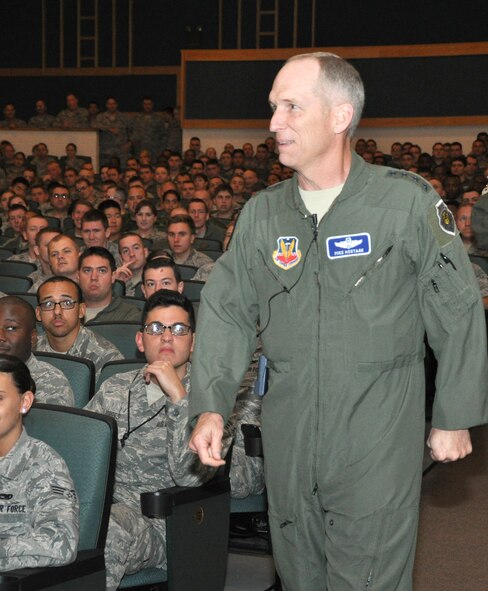 Gen. Mike Hostage, commander of Air Combat Command, prepares to speak to members of the 552nd Air Control Wing during an All Call at the Team Tinker auditorium June 18. The general talked about changes in the Air Force promotion process, force shaping initiatives and the future of the Air Force as it copes with sequestration. (Air Force photo by Darren D. Heusel)