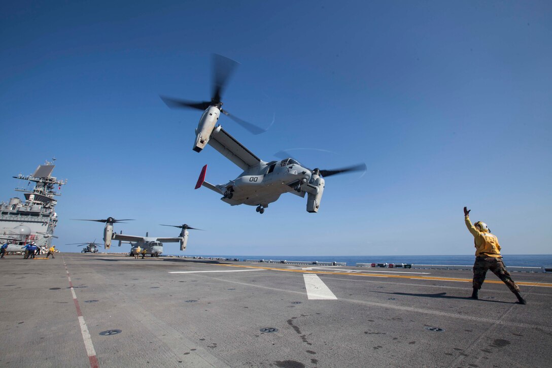 USS BONHOMME RICHARD, At Sea - An MV-22 Osprey with Marine Medium Tiltrotor Squadron 265 (Reinforced), 31st Marine Expeditionary Unit, takes off from the flight deck of the USS Bonhomme Richard (LHD 6) here, Feb 28. As the Aviation Combat Element of the 31st MEU, VMM-265 (REIN) brings integral capabilities to the MEU ranging from aerial reconnaissance to ship-to-shore transport and close air support.  The 31st MEU is currently conducting amphibious integration training alongside Amphibious Squadron 11 while deployed for its regularly scheduled Spring Patrol. (Official U.S. Marine Photo by Cpl. Henry Antenor)