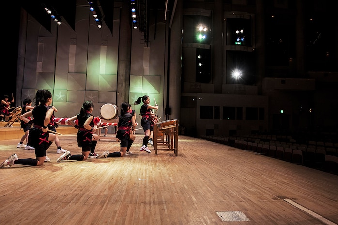 Participants of the 2014 U.S.-Japan Friendship Concert perform on taiko drums and other instruments during the concert that took place inside the Iwakuni Sinfonia Feb. 15. Several schools from out in Iwakuni and Matthew C. Perry Schools attended the event.