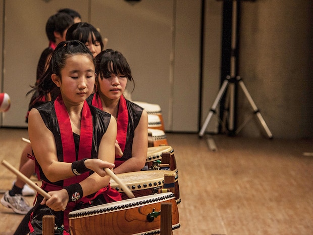 Participants of the 2014 U.S.-Japan Friendship Concert perform on taiko drums during the concert that took place inside the Iwakuni Sinfonia Feb. 15. Several schools from out in Iwakuni and Matthew C. Perry Schools attended the event.