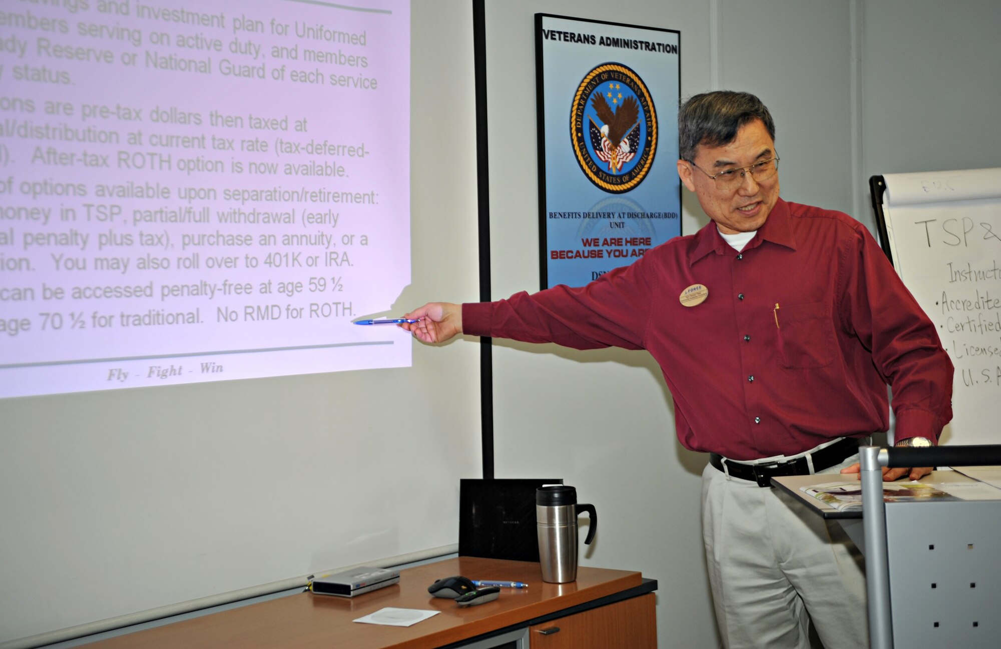 Sun Park, Airman and Family Readiness Center community readiness consultant, describes different thrift savings plan options to attendants of the Military Saves Week TSP and retirement class in the A&FRC classroom at Osan Air Base, Republic of Korea, Feb. 26, 2014. Park began the class by asking what each person wanted to learn about to make sure that everyone left with the necessary information to help them reach their financial goals. (U.S. Air Force photo/Airman 1st Class Ashley J. Thum) 