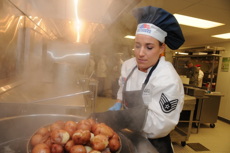 Staff Sgt. Brennan Gill with the 185th services flight prepares red potatoes for the afternoon meal at the 185th Air Refueling Wing (ARW) kitchen on March 01, 2014, in Sioux City, Iowa. The 185th ARW services flight is one of three units in the nation competing for the best kitchen award.
U.S. Air National Guard Photo by: Tech Sgt. Oscar Sanchez/Released
