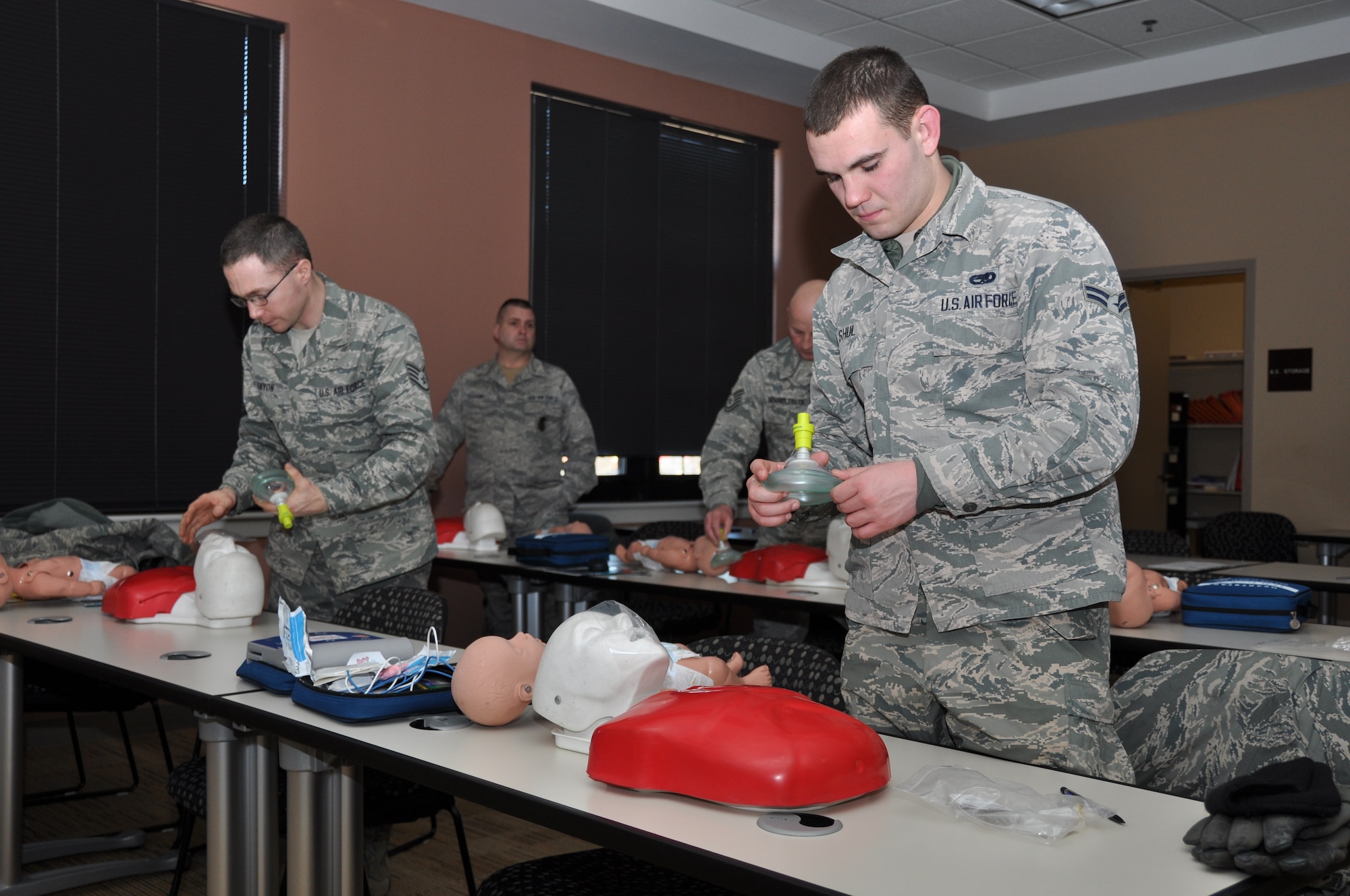 Airman 1st Class Michael Shul, 914th Maintenance Squadron, participates in a CPR class here, February 28, 2014. The training, instructed by members of the Base Fire Department, offered a combination of classroom and hands-on portions, where the Airmen tested their CPR skills on medical instruction dummies. (U.S. Air Force photo by Staff Sgt. Stephanie Clark)  