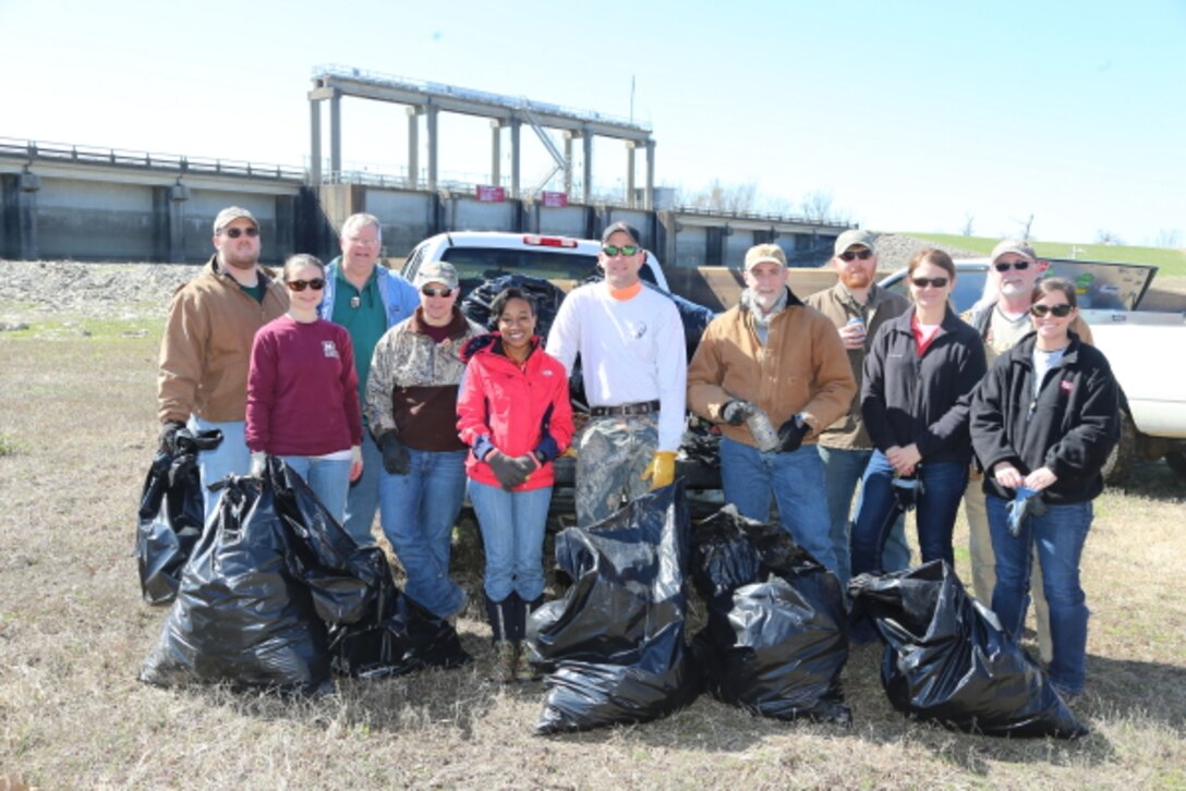 Regulatory employees at the Steele Bayou Drainage Control Structure participated in a clean up day. 
(shown left to right)Jared Everitt, Jana Jacobson, Arel Simpson, Jim Cole, Charlene Mosely, Bert Turcotte, Mike Stewart, Jeremy Stokes, Jennifer Mallard, Mike Miller and Cori Shiers