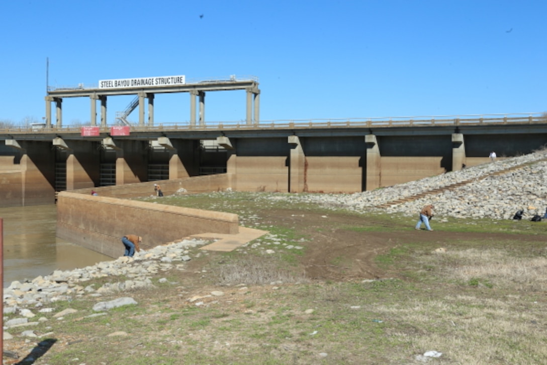 Regulatory employees at the Steele Bayou Drainage Control Structure cleanup during Earth Day