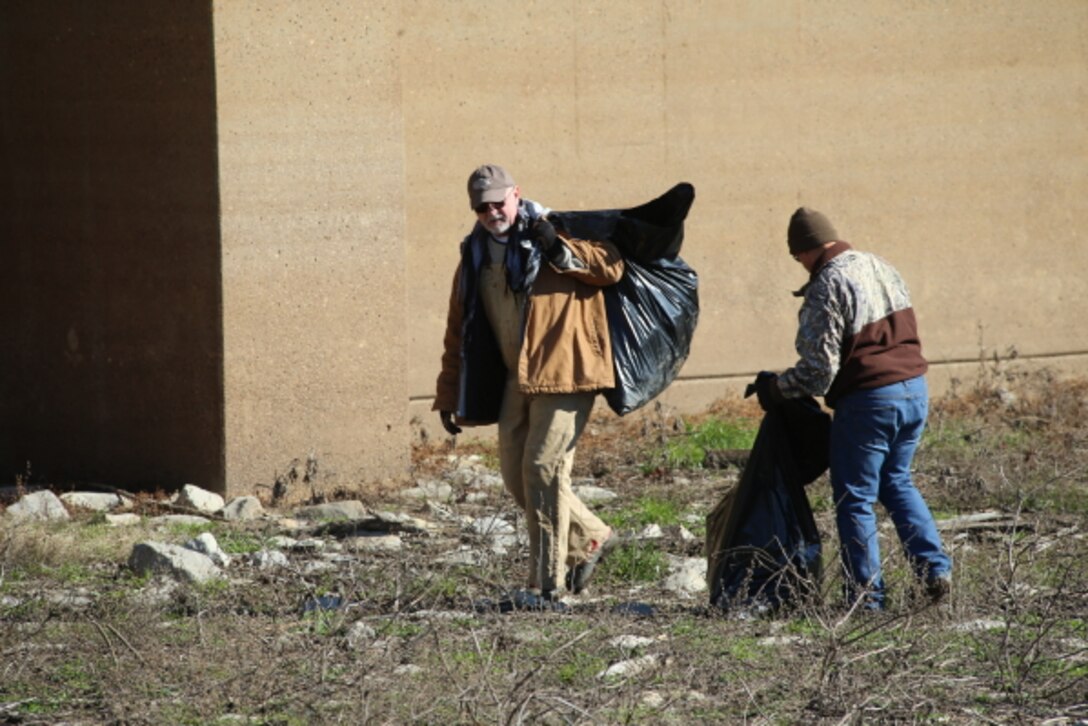 Regulatory employees at the Steele Bayou Drainage Control Structure participated in a clean up day. (shown Mike Miller, Jim Cole)