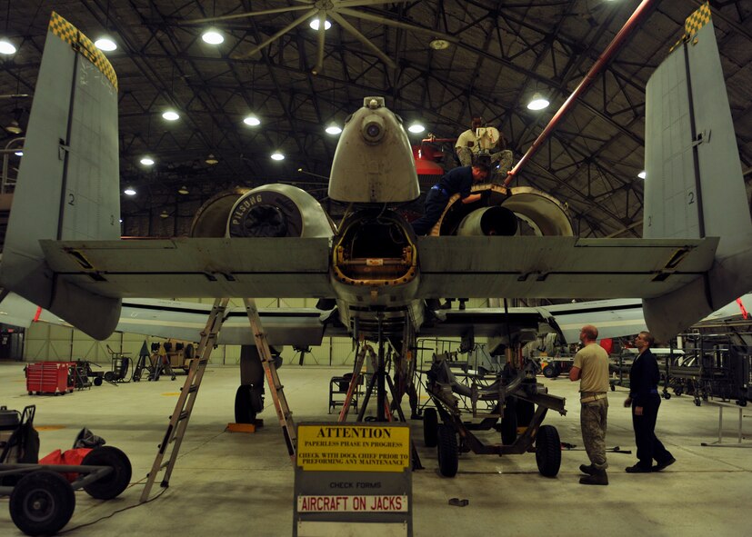 Propulsion technicians from the 51st Maintenance Squadron and 51st Aircraft Maintenance Squadron prepare an A-10 Thunderbolt II engine to be mounted on the aircraft’s frame at Osan Air Base, Republic of Korea, Feb. 28, 2014. The A-10 operates off of two General Electric TF34-GE-100 turbofan engines and was designed for close air support, airborne forward air control and combat search and rescue operations. (U.S. Air Force photo/Senior Airman Siuta B. Ika)