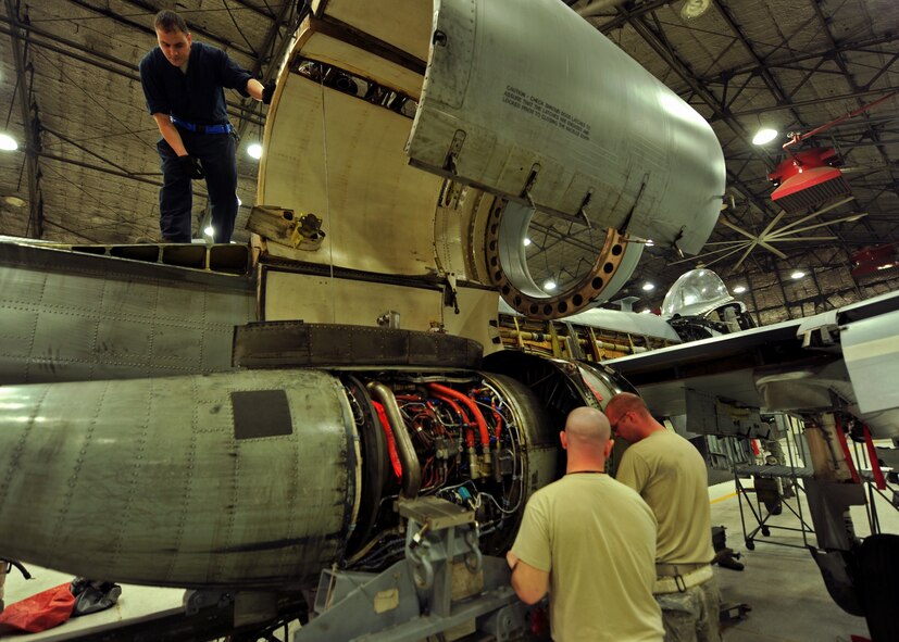 Propulsion technicians from the 51st Maintenance Squadron and 51st Aircraft Maintenance Squadron prepare an A-10 Thunderbolt II engine to be mounted on the aircraft’s frame at Osan Air Base, Republic of Korea, Feb. 28, 2014. The Airmen who work on Osan’s A-10 engines are fully trained and qualified to handle a multitude of procedures. (U.S. Air Force photo/Senior Airman Siuta B. Ika)