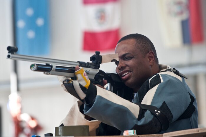 Vincent Pacely, an adaptive sports camp participant, takes aim with an airsoft rifle during an Air Force Wounded Warrior Adaptive Sports Camp Feb. 27, 2014, at Nellis Air Force Base, Nev. During the three-day sports camp wounded warriors practiced for the upcoming Warrior Games. (U.S. Air Force photo by Senior Airman Matthew Lancaster)