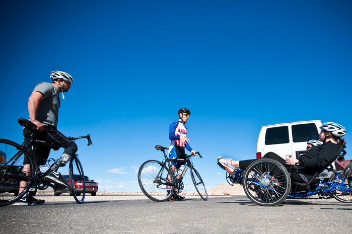 (center) Ian Holt, U.S. Armed Forces cycling team member, briefs wounded warriors participant during an Air Force Wounded Warrior Adaptive Sports Camp Feb. 26, 2014, at Nellis Air Force Base, Nev. The sports camp prepares individuals with disabilities to develop independence, confidence and fitness through participation in community sports. (U.S. Air Force photo by Senior Airman Christopher Tam)