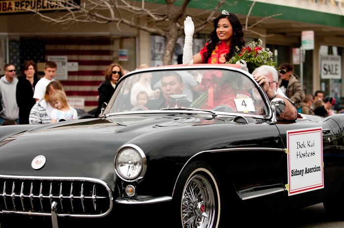 Sidney Asercion, Bok Kai Hostess, waves at the crowds at the Bok Kai Parade March 1, 2014 in Marysville, Calif. This year the Bok Kai Parade celebrated the Year of the Horse. (U.S. Air Force photo by Staff Sgt. Jonathan Steffen/Released)