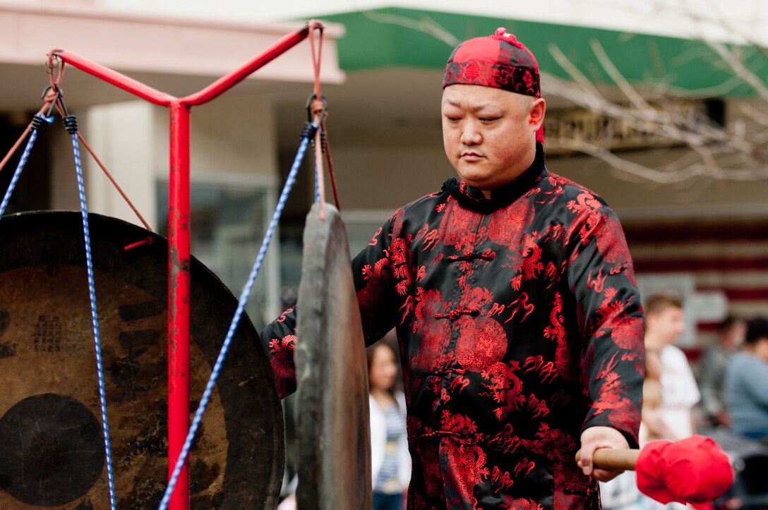 Al Wong Jr. hits the gong during the opening of the Bok Kai Parade March 1, 2014 in Marysville, Calif. The Bok Kai Parade celebrated its 134th year in Marysville. (U.S. Air Force photo by Staff Sgt. Jonathan Steffen/Released)