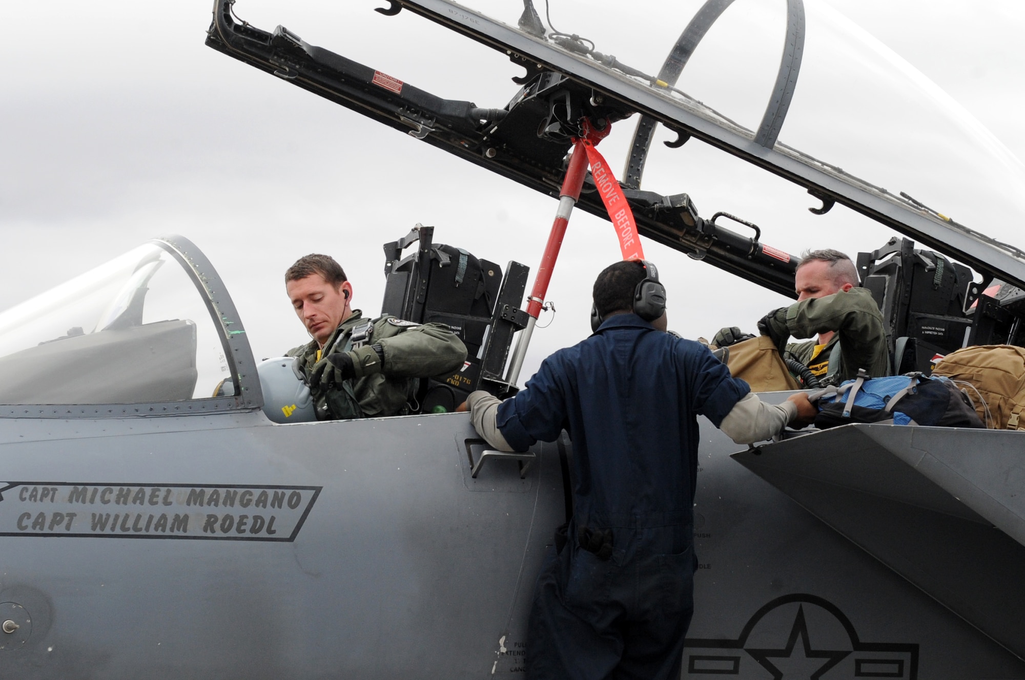 Capt. Rory Klepper, 336th Fighter Squadron pilot, and Capt. Gabriel Lewis, 336th FS weapons systems officer, pack their flight equipment after arriving at Nellis Air Force Base, Nev., Feb. 28, 2014. The 336th FS sent 14 F-15E Strike Eagles to Red Flag 14-2 from March 3-14, to participate in the advanced training program. (U.S. Air Force photo/Staff Sgt. Chuck Broadway)
