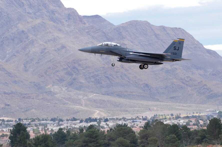 An F-15E Strike Eagle prepares to land at Nellis Air Force Base, Nev., following a cross country flight from Seymour Johnson Air Force Base, N.C, Feb. 28, 2014. The dual-role fighter aircraft is one of 14 assigned to the 336th Fighter Squadron scheduled to participate in Red Flag 14-2. (U.S. Air Force photo/Staff Sgt. Chuck Broadway)