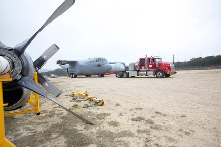 A retired C-130 Hercules cargo aircraft was partially disassembled and transported across major highways in San Antonio from Joint Base San Antonio-Lackland to the Medical Readiness Training Center at JBSA-Camp Bullis Sunday.  At the MRTC, 937th Training Group, headquartered at JBSA-Fort Sam Houston, instructors will eventually train about 1,300 military students each year who are participating in the aeromedical evacuation and patient staging course.  The 502nd Trainer Development Squadron members at JBSA-Randolph were responsible for the aircraft's four-hour move and will also accomplish the simulation project inside the aircraft that will simulate sights, sounds and smells of a medic's combat environment. (U.S. Air Force photo by Dan Solis)