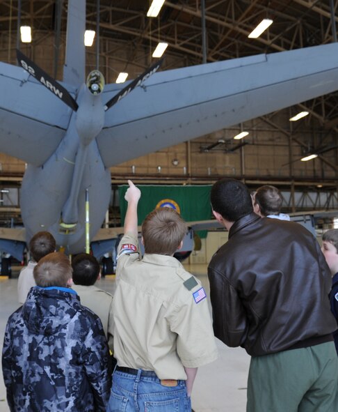 Airman 1st Class Will Pelkofer, 92nd Air Refueling Squadron boom operator, shows Rosalia Boy Scouts different parts of a KC-135 Stratotanker during a base tour at Fairchild Air Force Base, Wash., Feb. 26, 2014. The scouts toured an aircraft to better understand Fairchild's mission. (U.S. Air Force photo by Airman 1st Class Janelle Patiño/Released)