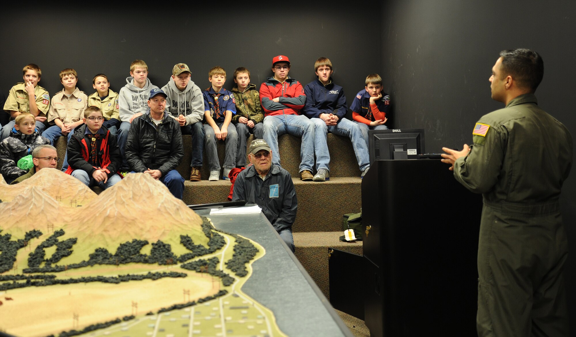 Tech. Sgt. Vikas Kumar, 92nd Aerospace Medicine Squadron aerospace and operational physiology NCO in charge, briefs Rosalia Boy Scouts during a base tour at Fairchild Air Force Base, Wash., Feb. 26, 2014. The tour consisted of 13 boy scouts and six adults including an Air Force veteran. (U.S. Air Force photo by Airman 1st Class Janelle Patiño/ Released)